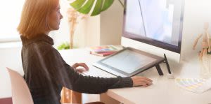 selective focus photo of baby playing activity cube