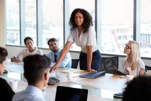 selective focus photo of baby playing activity cube