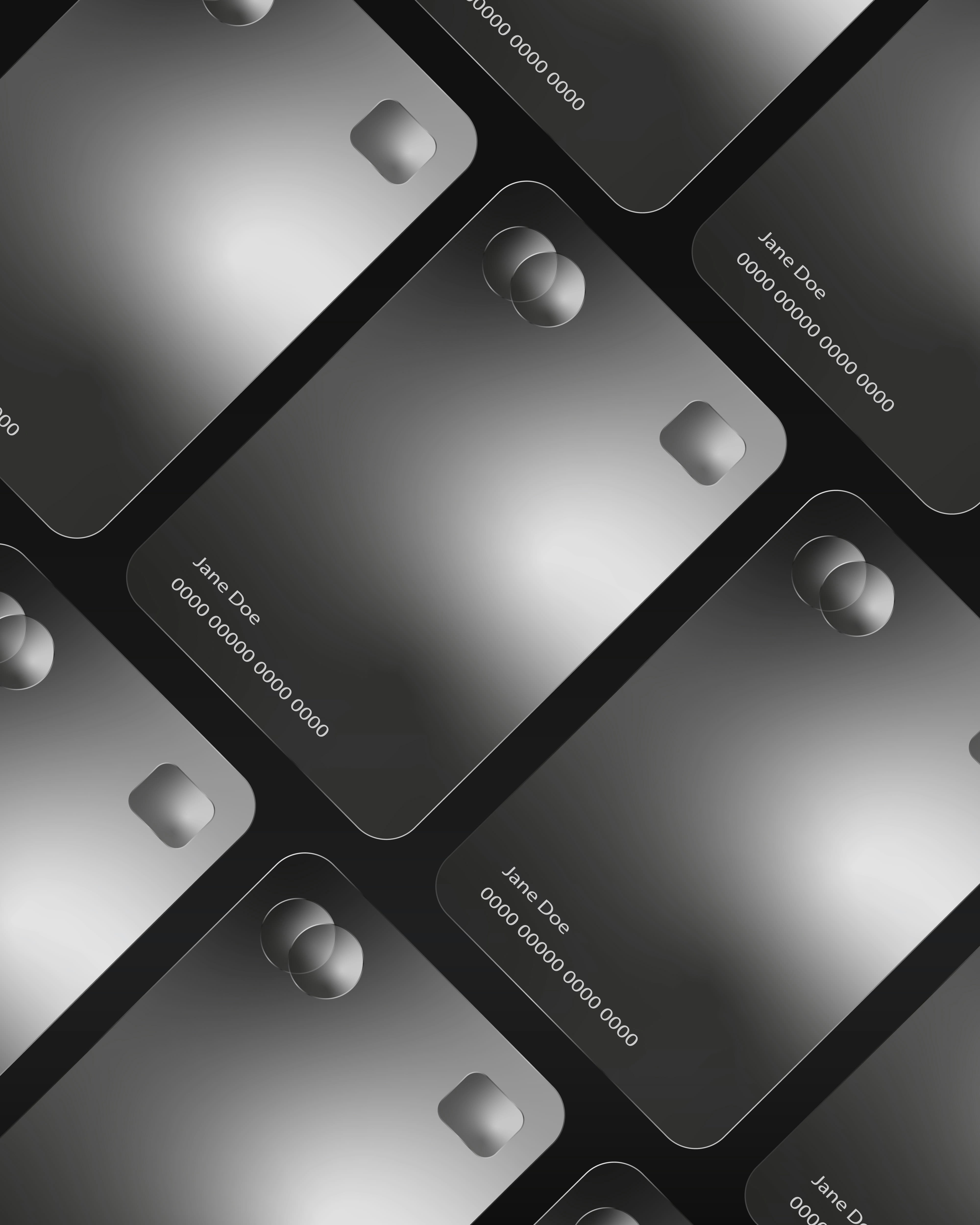 Multiple credit cards arranged in a pattern.