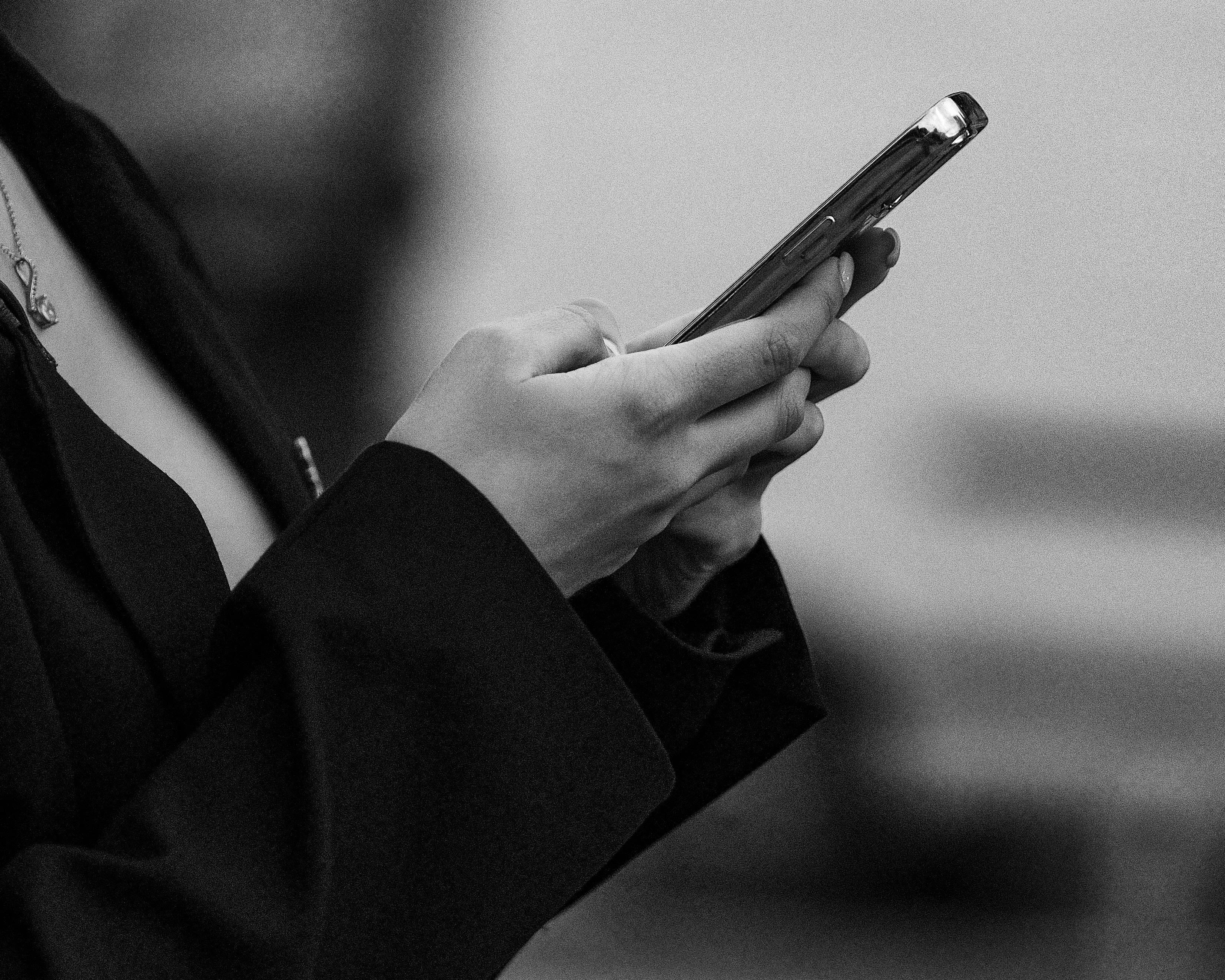 Person using a smartphone with both hands